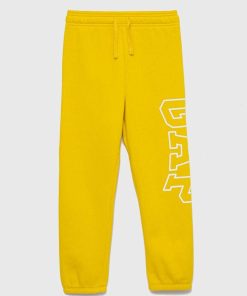 GAP pantaloni de trening pentru copii culoarea galben, cu imprimeu 9BYY-SPB0D8_11X